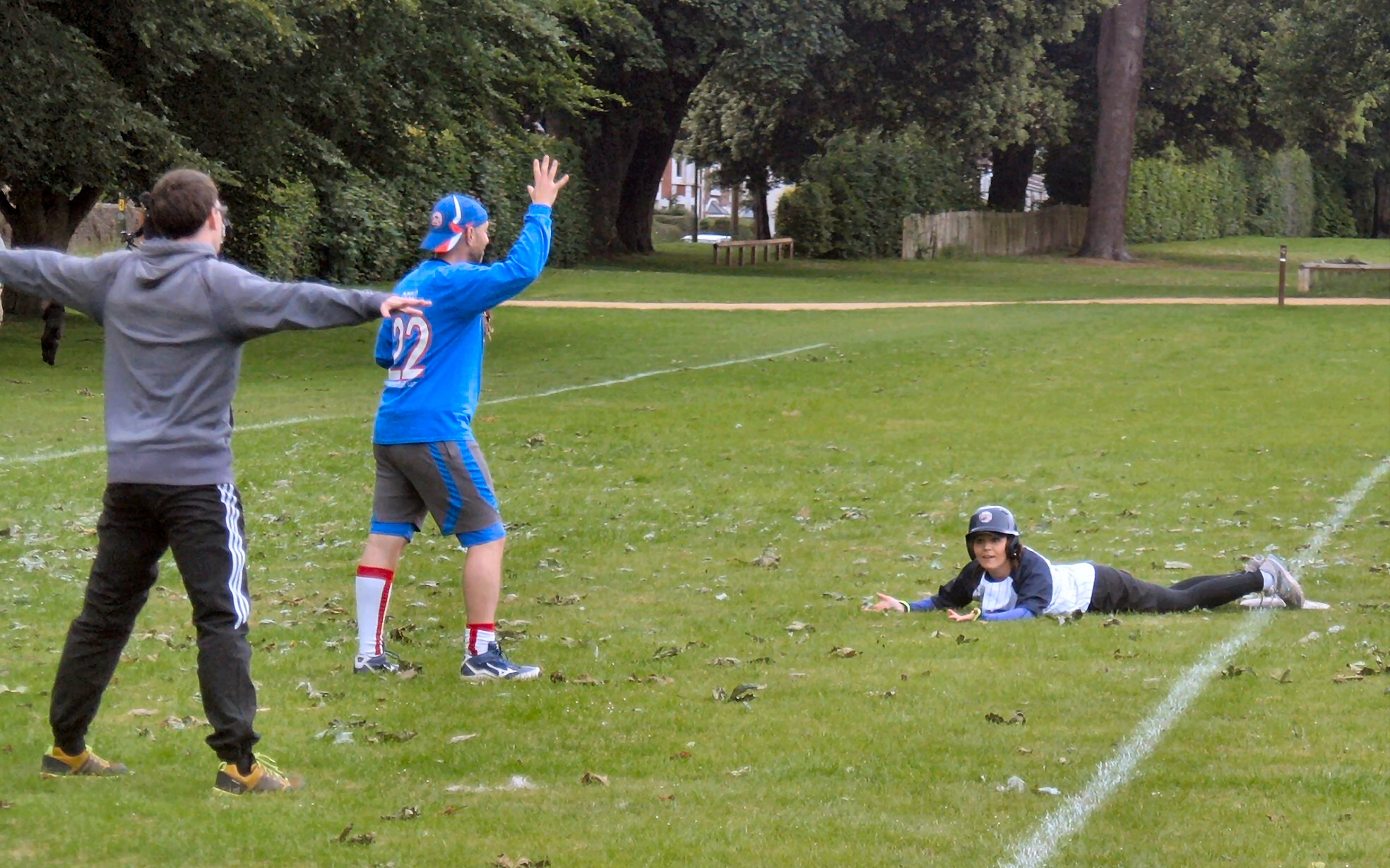 Anne Rutherford makes it to third base safely